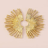 Boucles d'oreilles en métal avec bord ondulé