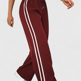 Pantalons de sport Alanys à jambes larges avec détails sur les côtés