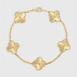 Bracelet en plaqué or avec motif de trèfle et élégance