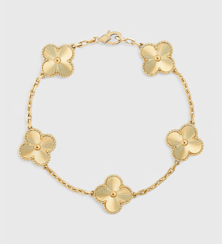 Bracelet en plaqué or avec motif de trèfle et élégance