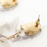 Boucles d'oreilles en forme de pétale d'orchidée