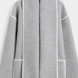 Manteau Pauline à coupe ample avec écharpe frangée intégrée