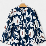 Blouse Filomena avec patte de boutonnage mi-longue et manches bouffantes en imprimé floral abstrait