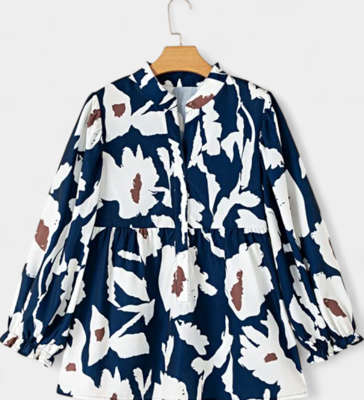 Blouse Filomena avec patte de boutonnage mi-longue et manches bouffantes en imprimé floral abstrait