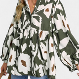 Blouse Filomena avec patte de boutonnage mi-longue et manches bouffantes en imprimé floral abstrait